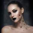 dodatek do stroju makijaz na halloween wodne tatuaze zmywalne pajaki czarne 32 szt